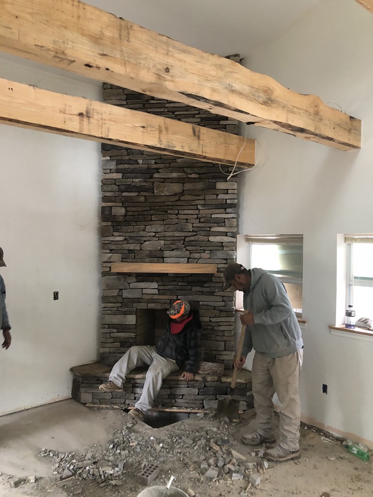 A real fireplace — I hate the gas inserts — and locally milled pine beams